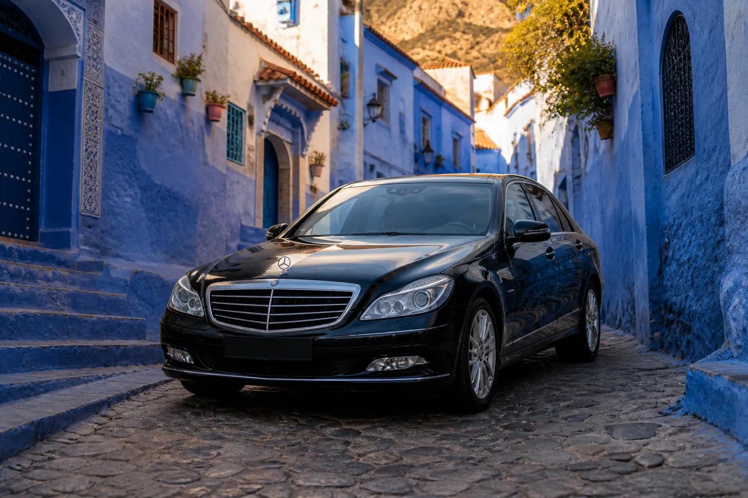 Private transfer vehicle on the Rif road toward the blue medina of Chefchaouen